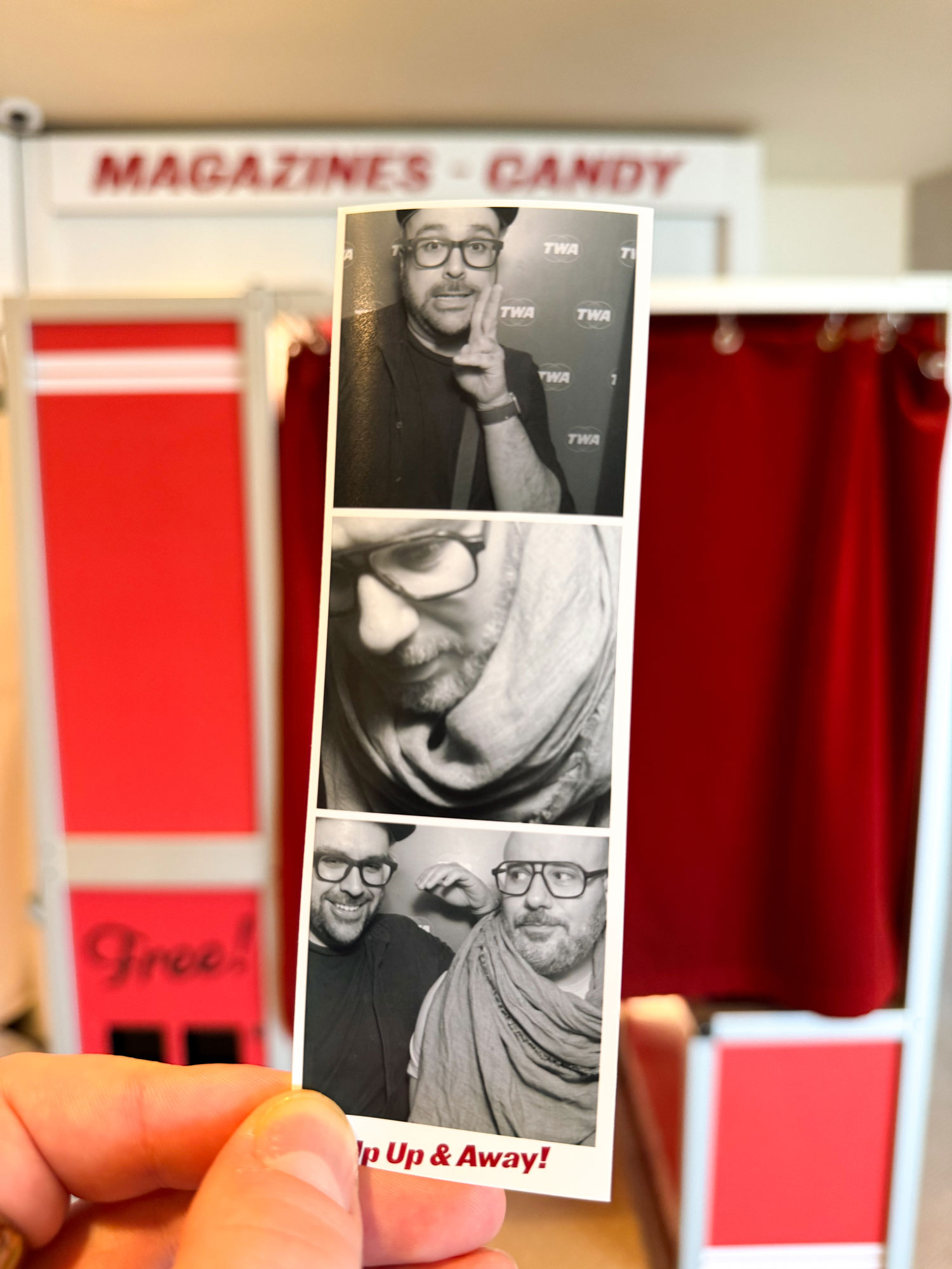 Photo of a film strip from a photo booth of Patrick and Kyle