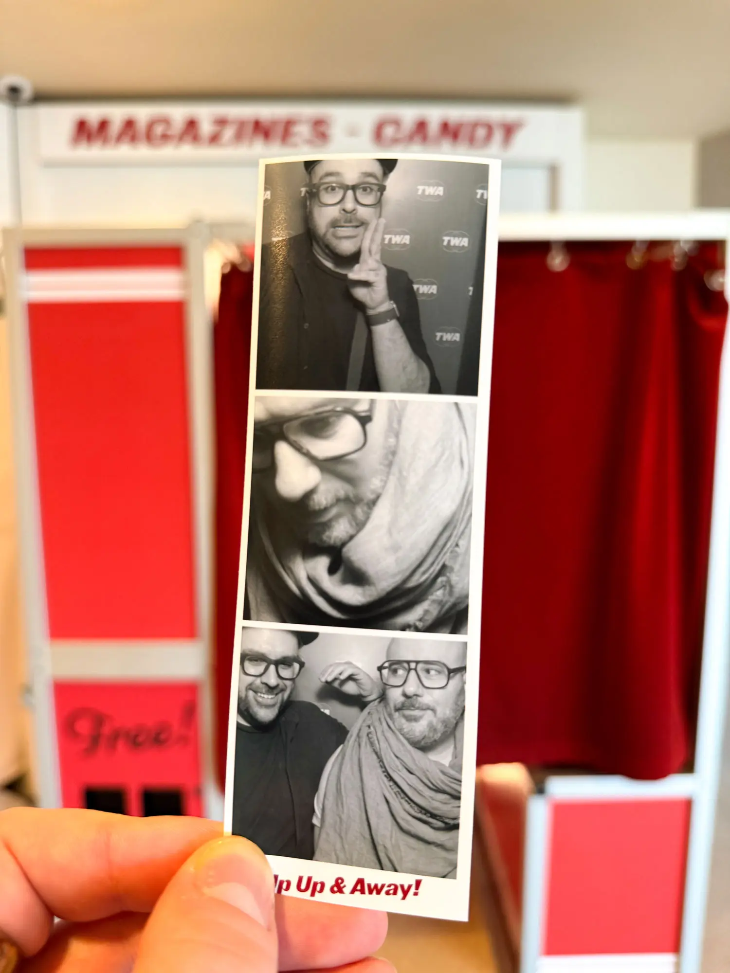 Photo of a film strip from a photo booth of Patrick and Kyle